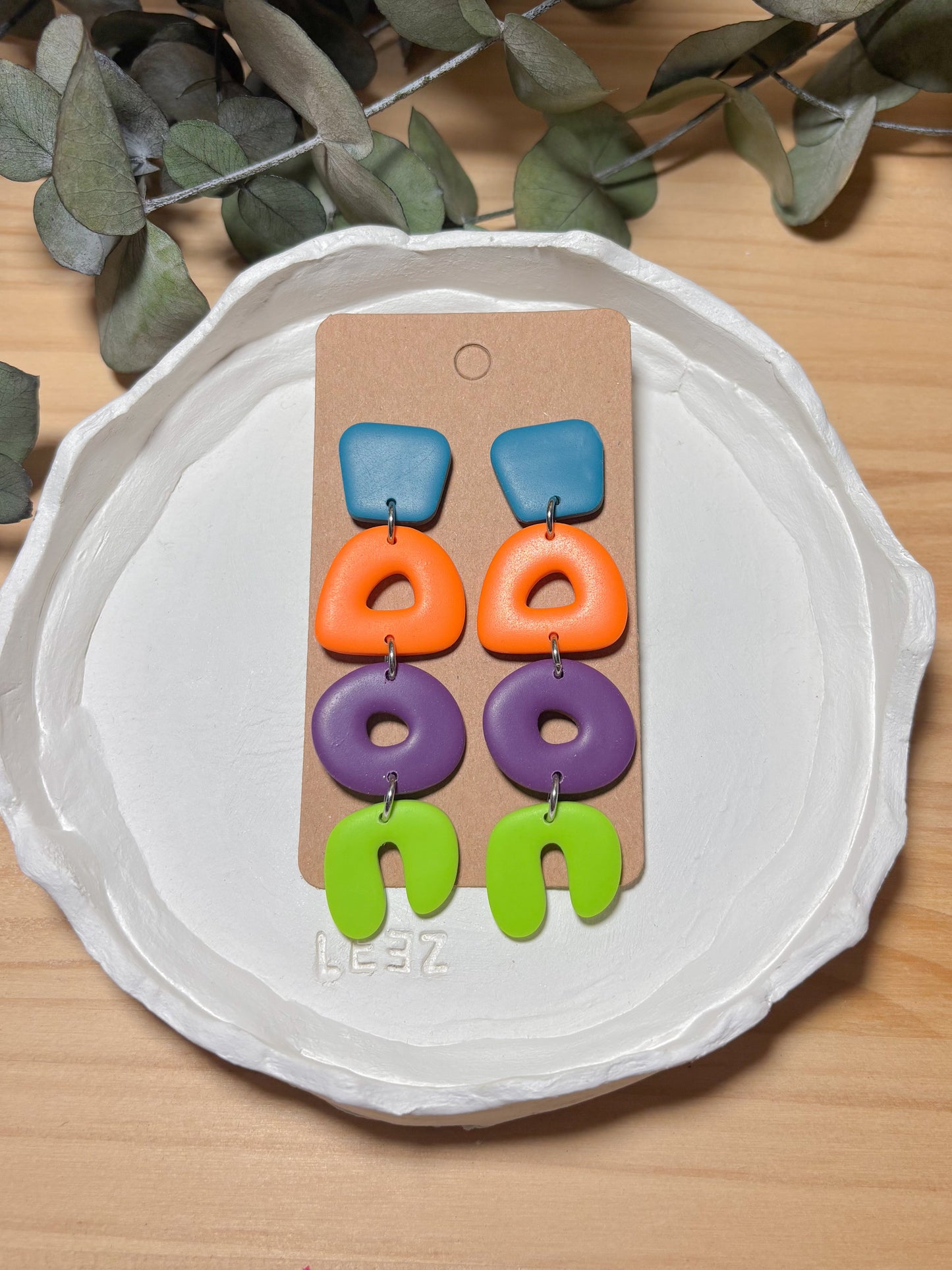 Modelo Begur - Azul, naranja, morado y verde