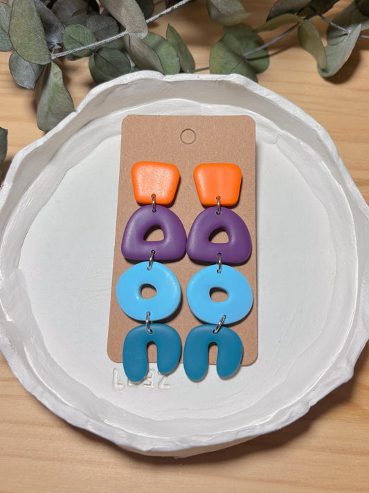 Modelo Begur - Naranja, morado y azul