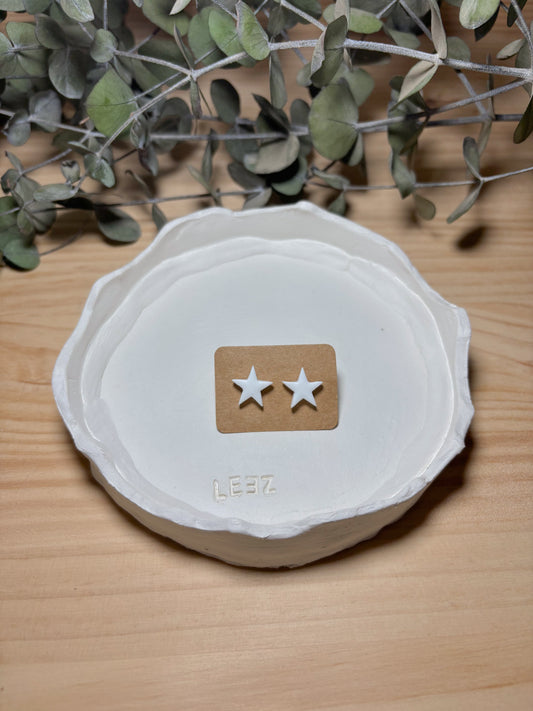 Pendiente estrella blanca