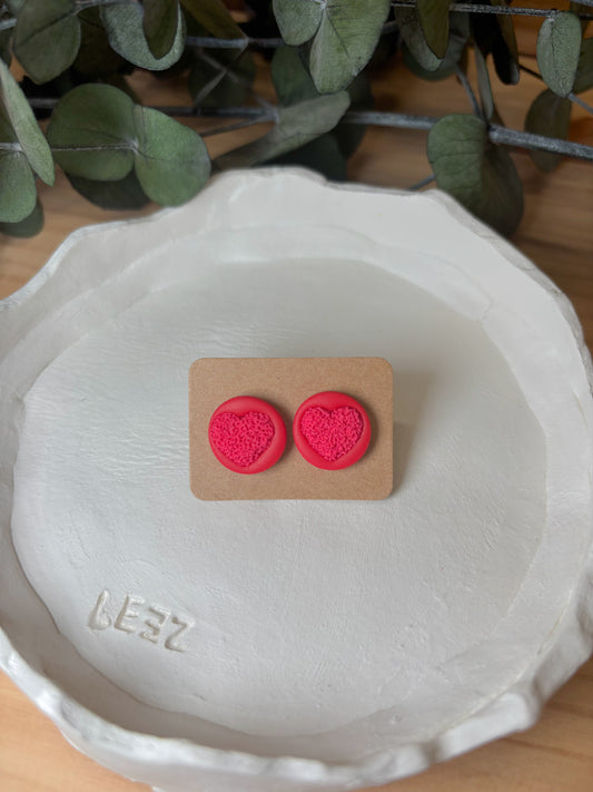 Corazón relieve tonos rojos