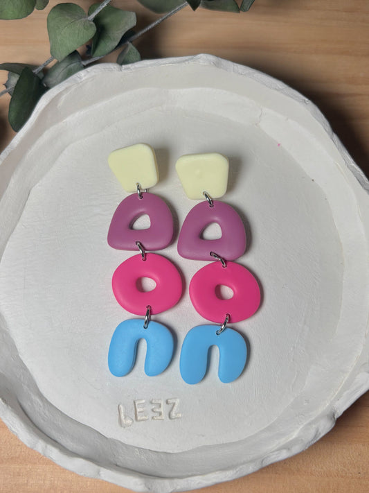 Modelo Begur - Mantequilla, morado, rosa y azul
