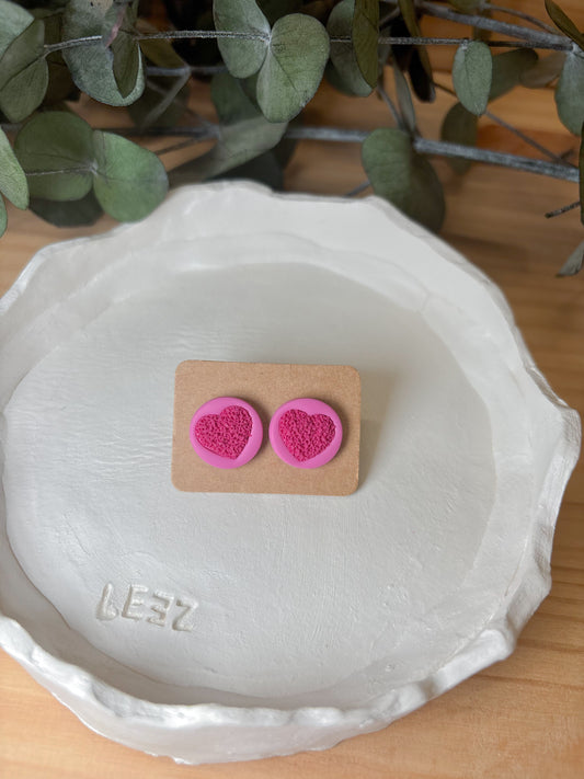 Corazón relieve tonos rosas